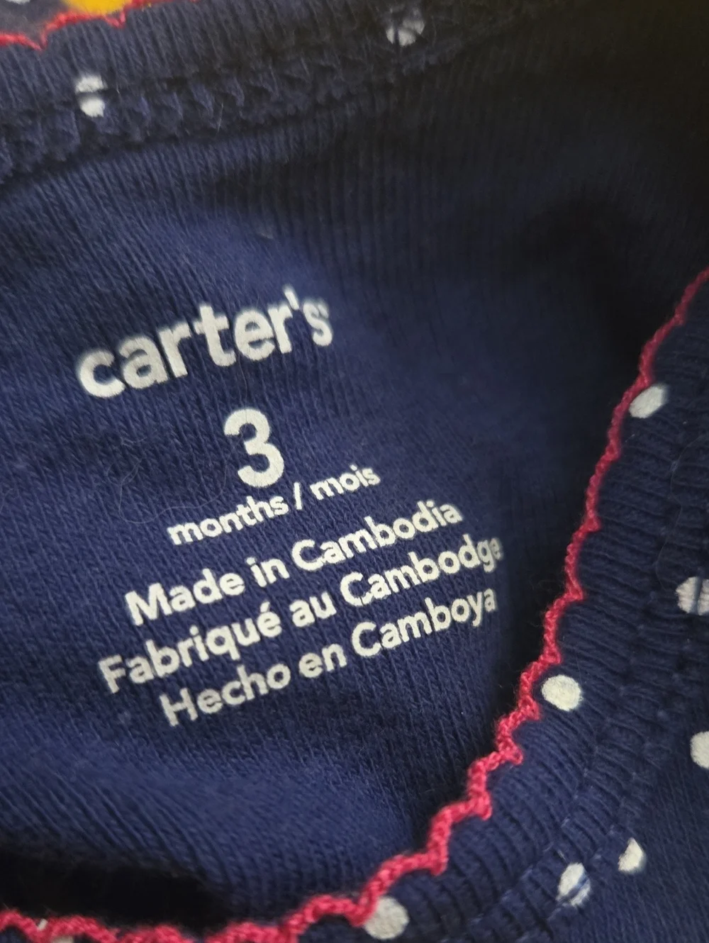 Carter's Onesie with polka dots and matching leggings.